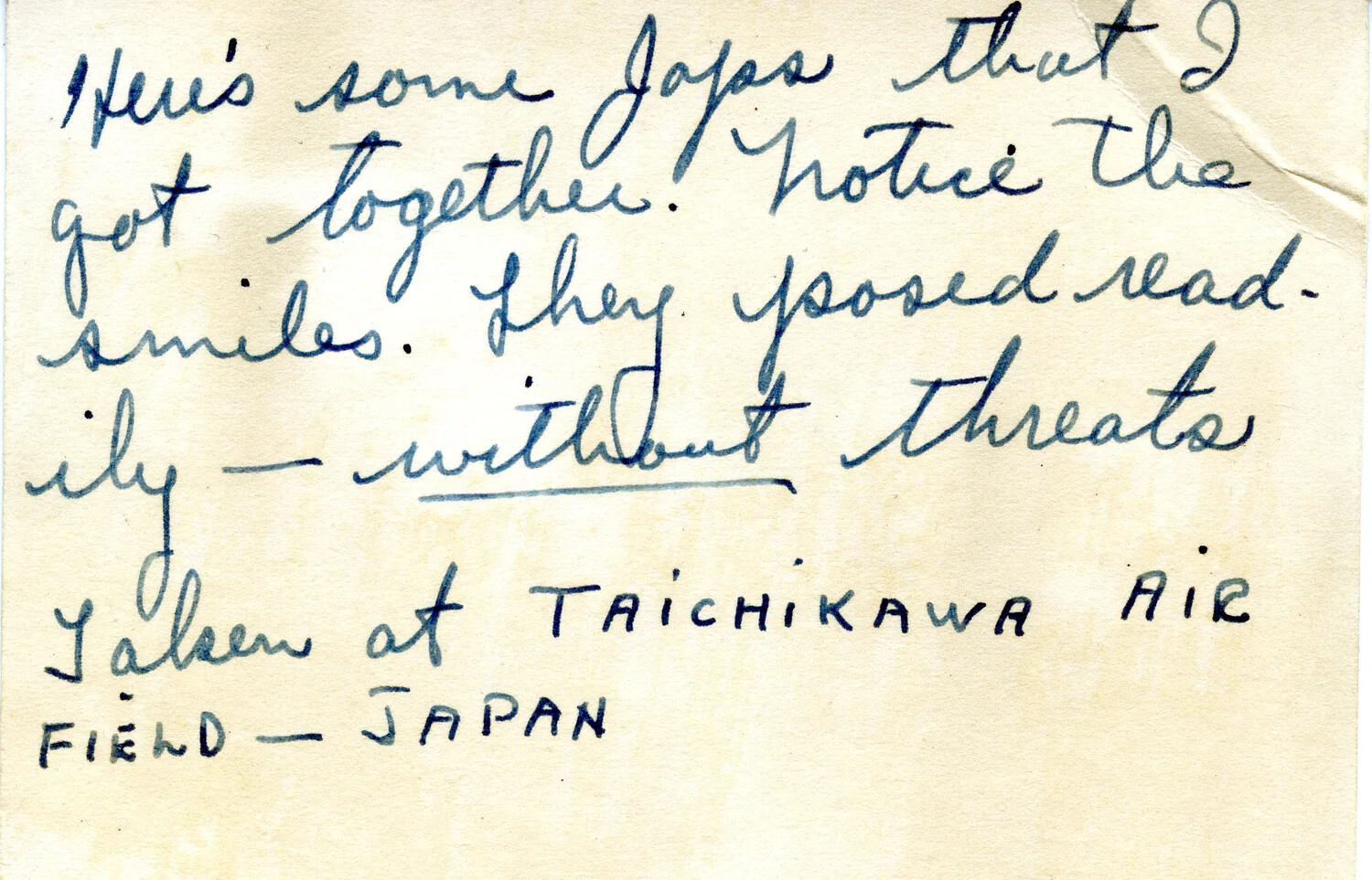 Handwritten Album Caption: Group Photo of Japanese Men "Taken at Taichikawa Air Field — Japan"