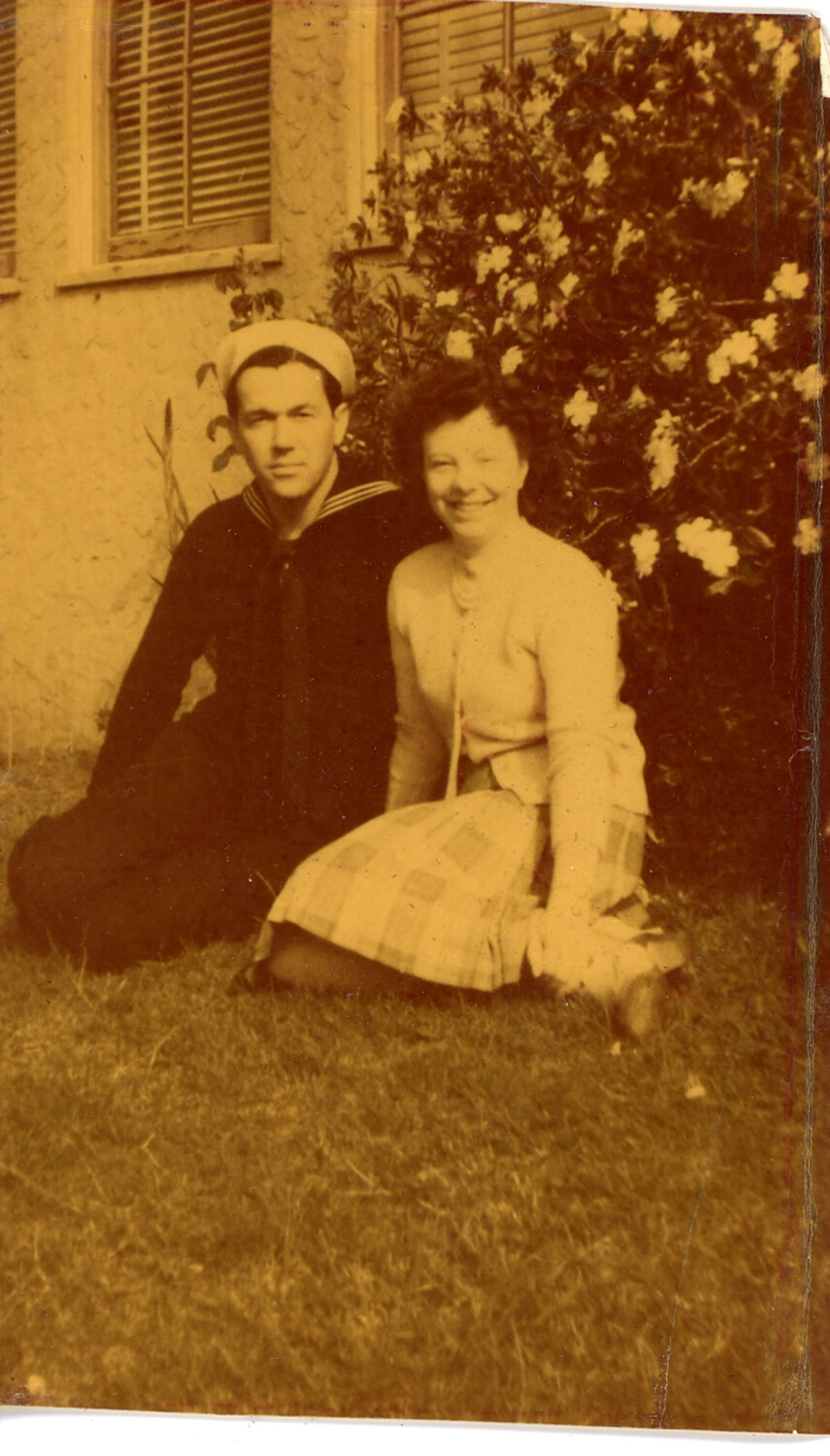Portrait of U.S. Navy Sailor and Woman Seated in Garden, WWII Era