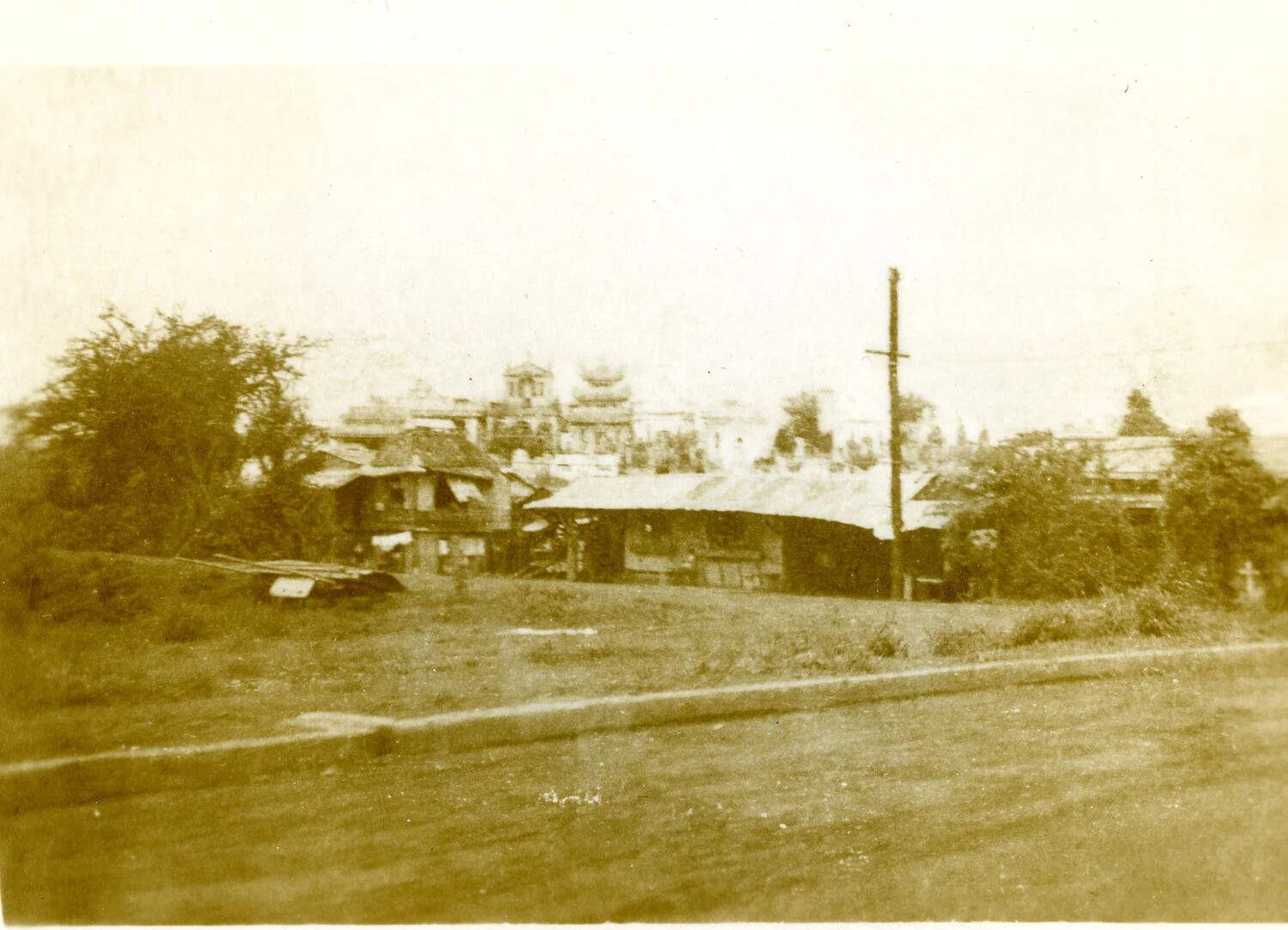 Distant View of Village with Temple/Pagoda Structure, 345th Bombardment Group Album, Pacific Theater WWII