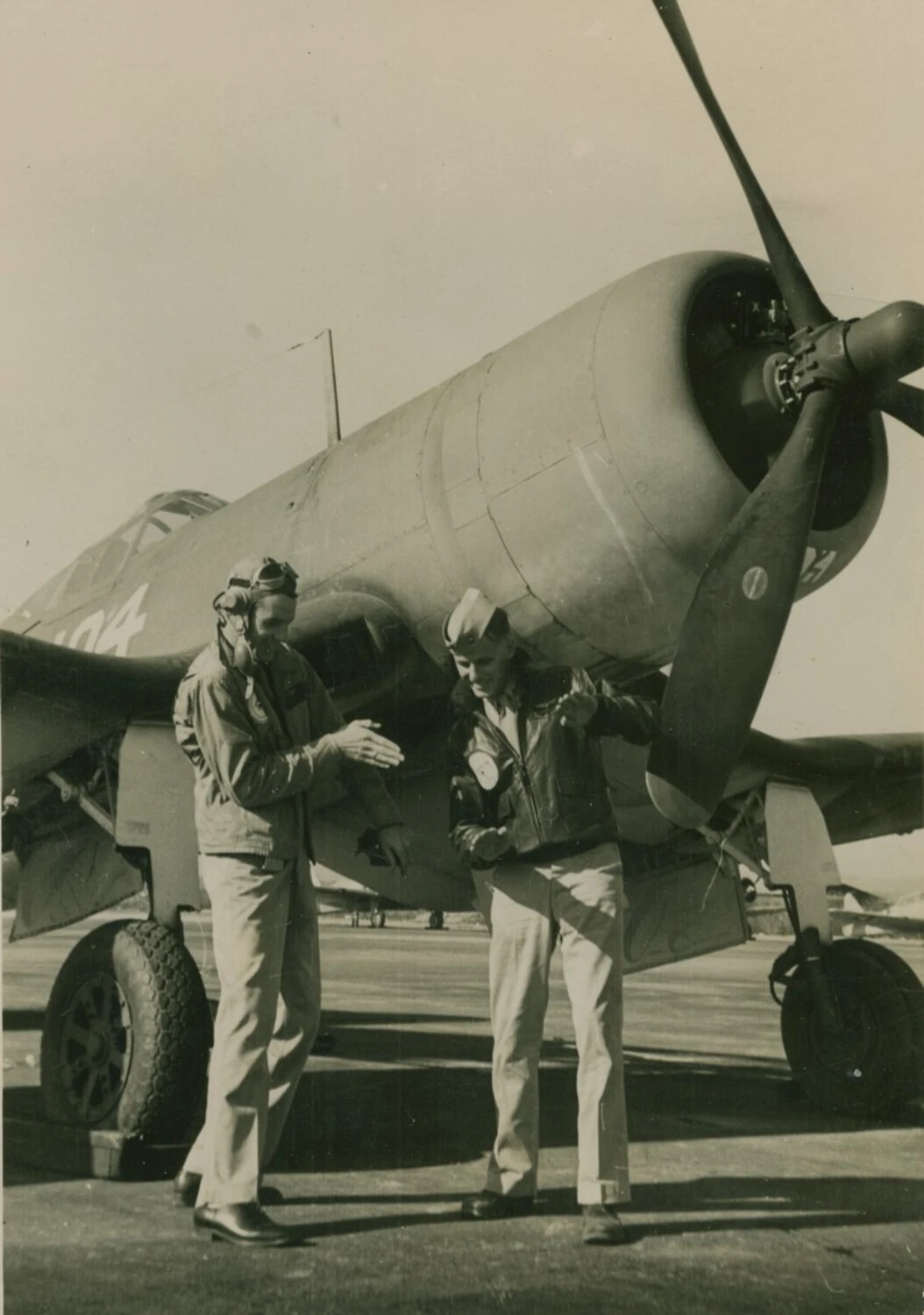 Two Marine Aviators Beneath F4U Corsair "104," McAleer Collection