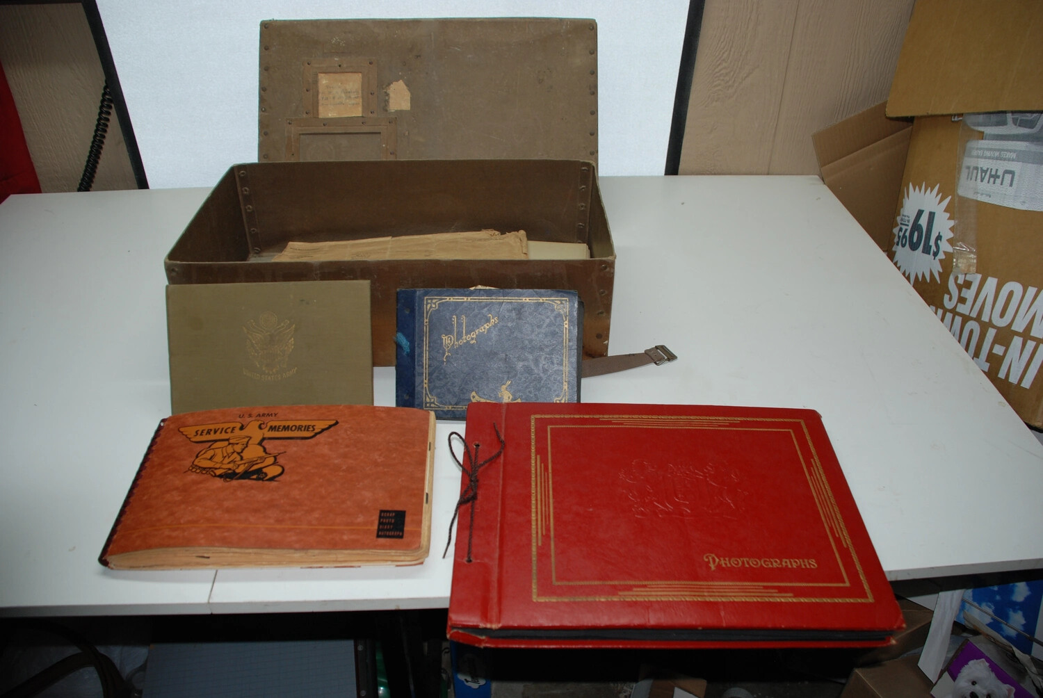 Jack T. Kelley Collection: Opened Footlocker with Photo Albums and Scrapbooks, Archival Documentation