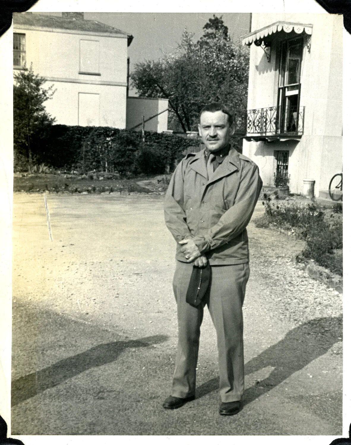 U.S. Army Officer Posed Outside European Residence, WWII Signal Corps Album