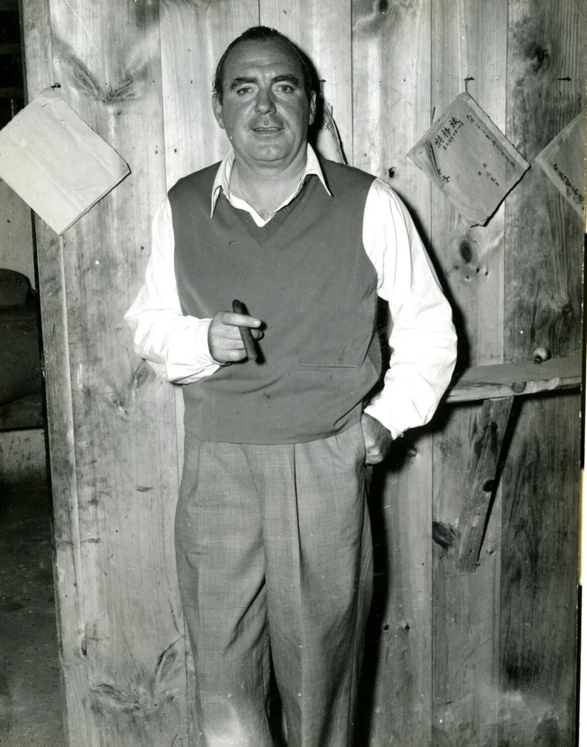 Western Civilian Man with Cigar Before Wooden Wall with Chinese Notices, CBI Theater Era