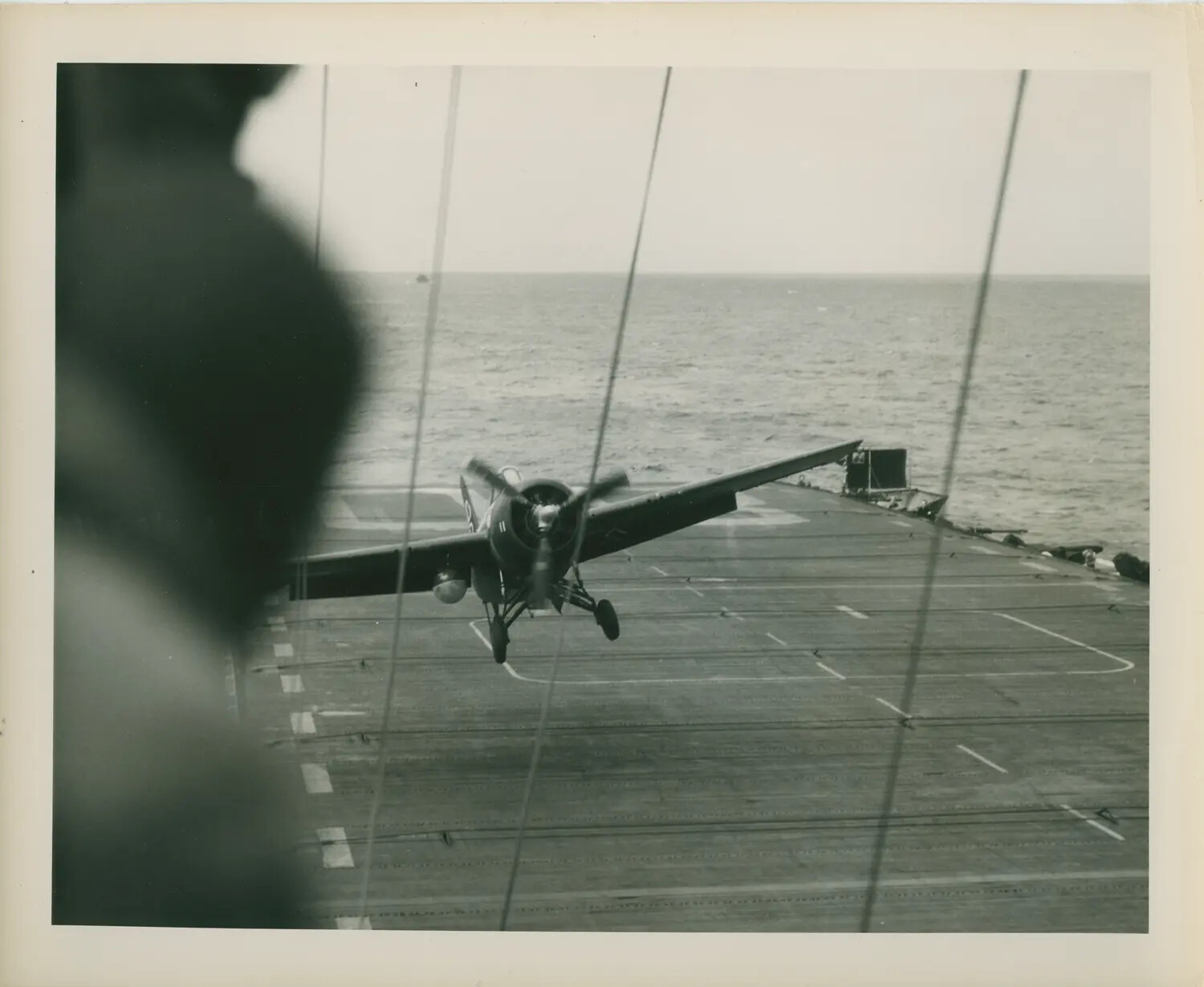 Carrier Fighter Landing Aboard USS Petrof Bay (CVE-80), WWII Pacific Theater