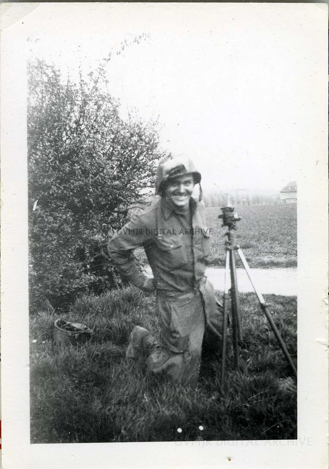 Paratrooper with Surveying Instrument (Aiming Circle) in Field, European Theater, WWII