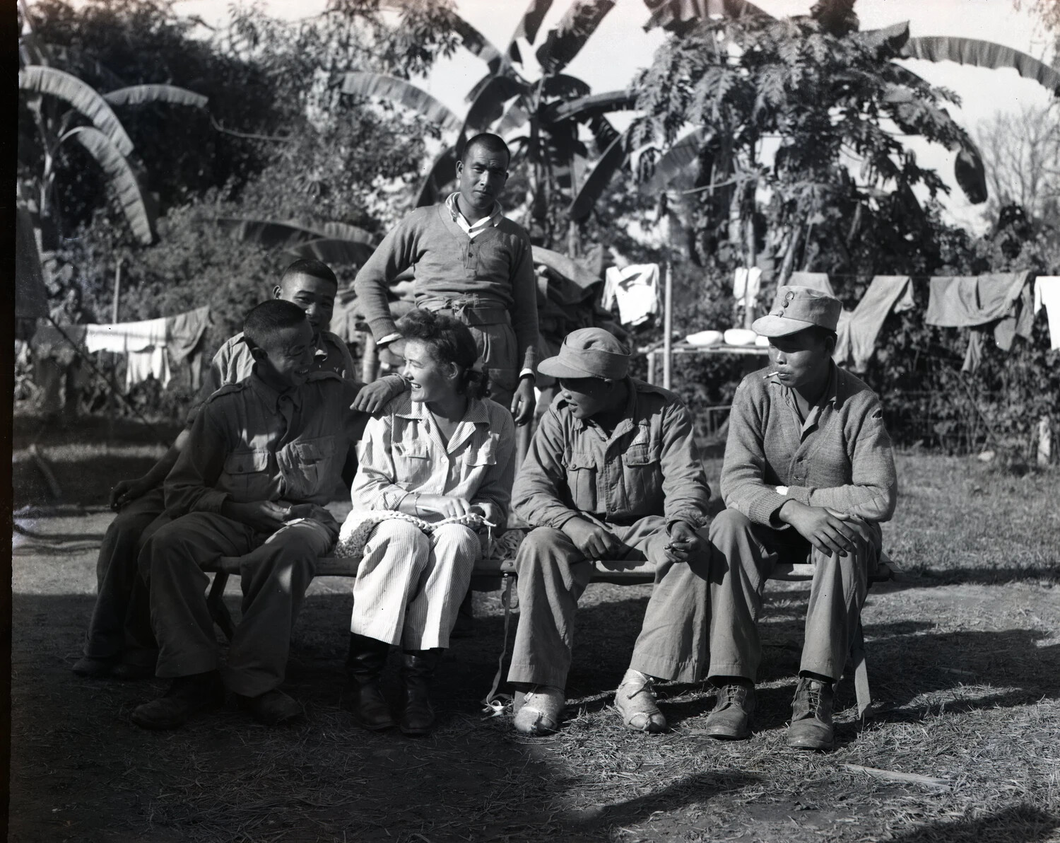 Chinese Nationalist Soldiers and Western Civilian Woman at a Jungle Camp, China-Burma-India Theater, WWII