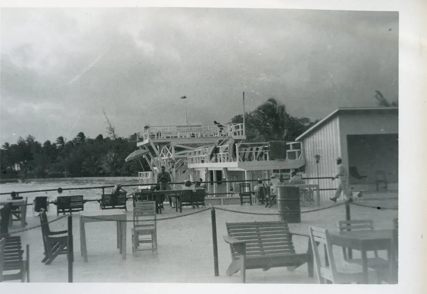 Military Beach Recreation Club with Diving Platform, Palm Grove and Overcast Sky, WWII-Era Pacific/Tropical Installation