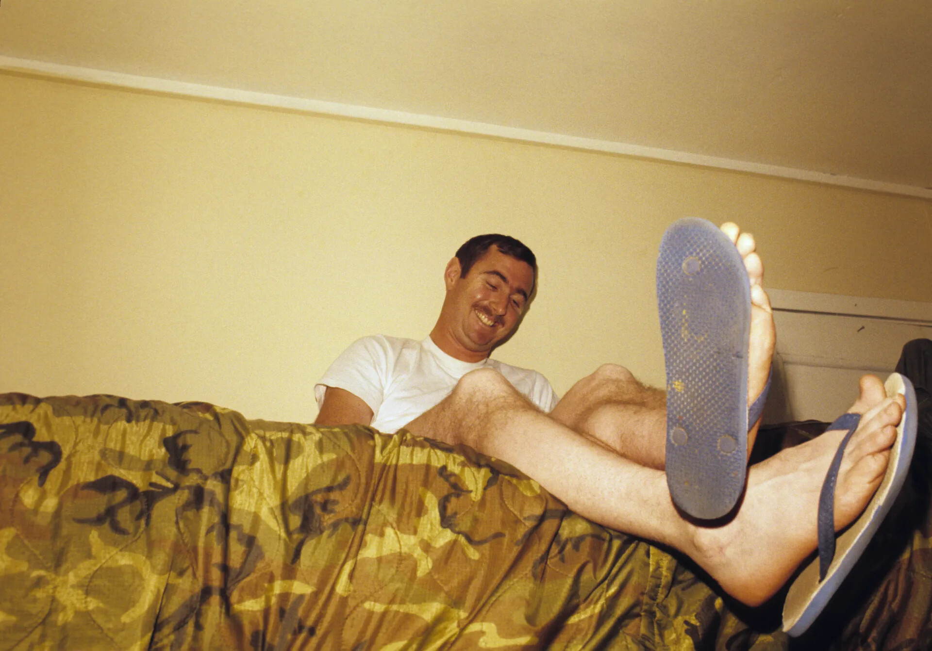 Serviceman Relaxing on Bed, Candid Off-Duty Photograph