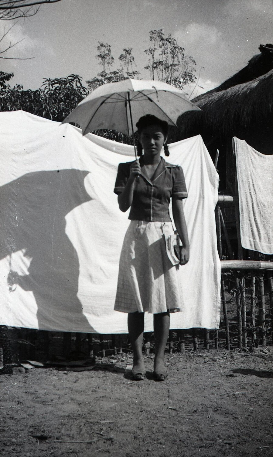 Portrait of a Young Filipino Woman with Umbrella, Luzon, Philippines, WWII Era