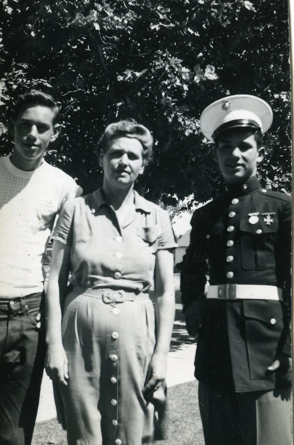 U.S. Marine in Dress Blue Uniform with Family Members, WWII Era, VMF-214 Album
