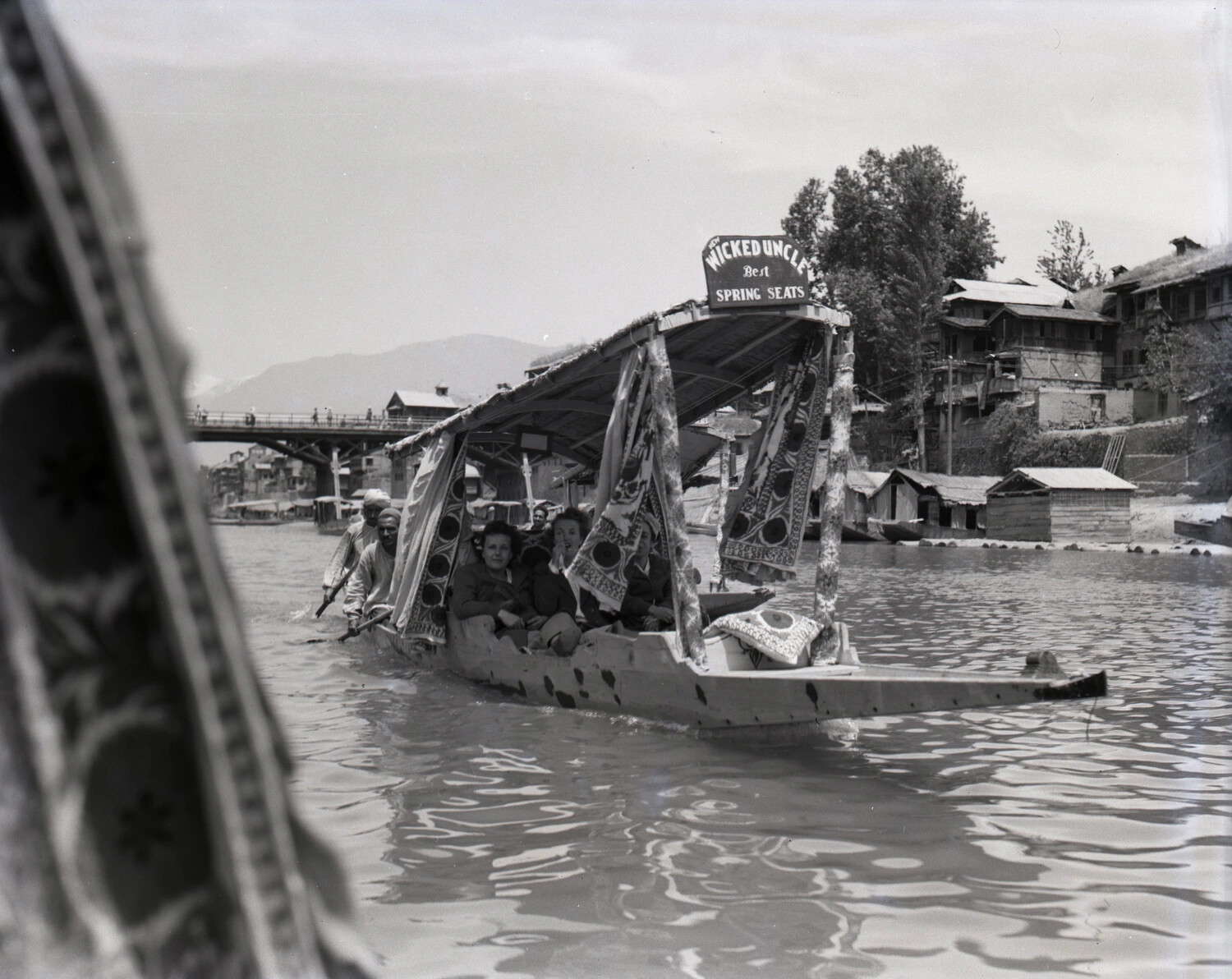 Shikara Boat 'Wicked Uncle' with Passengers on a Srinagar Waterway, Kashmir, WWII Era