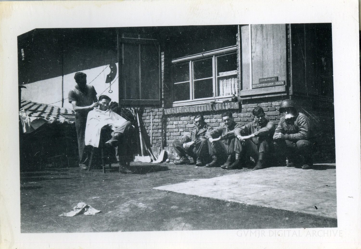 Outdoor Haircuts near a Former Soviet Reception Point, Occupied Germany, 1945