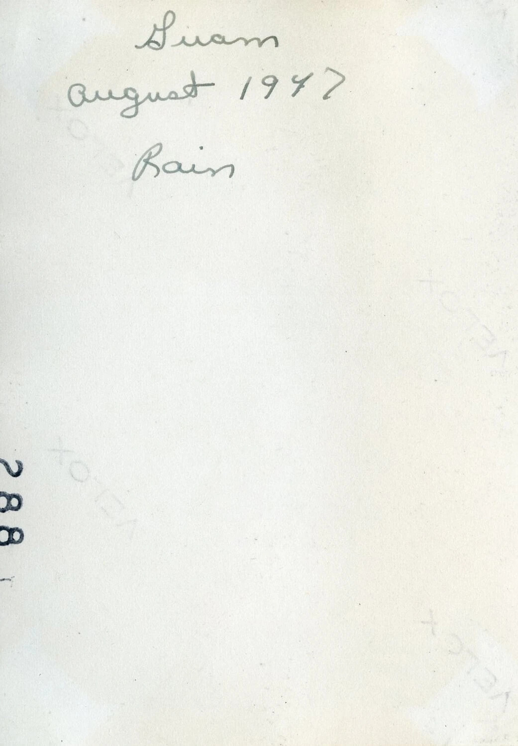 Handwritten Album Caption Page: 'Guam, August 1947, Rain' — VR-6 Naval Air Transport Squadron Album