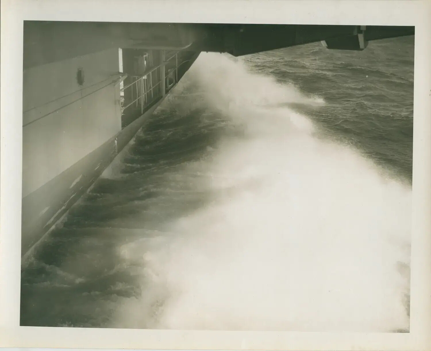 USS Petrof Bay (CVE-80) Plowing Through Heavy Seas, WWII Pacific Theater
