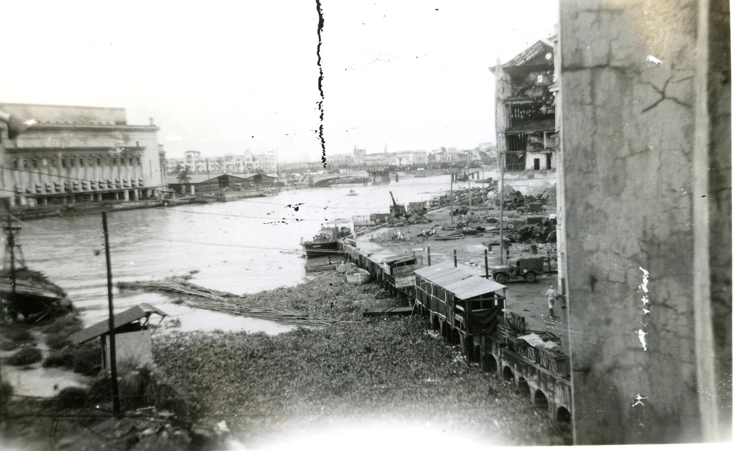 Pasig River, Manila, Showing War Damage and Military Vehicles Amid Rubble, WWII Photo Album