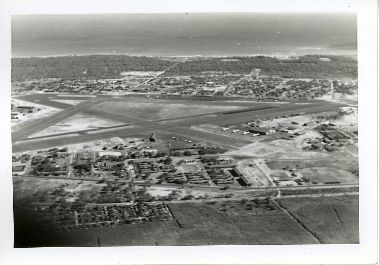 Aerial View of Crossed-Runway Military Airfield near Coastline, Hawaii (Second Frame)