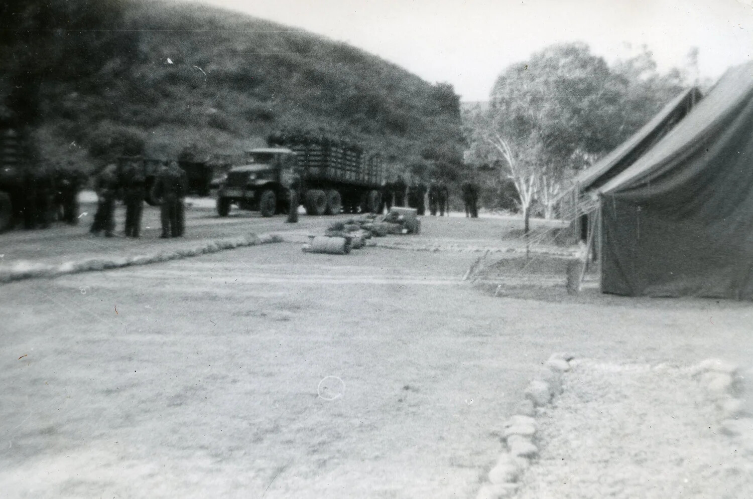 Marine Corps Camp Scene with Cargo Truck, VMF-214 Album, 1945