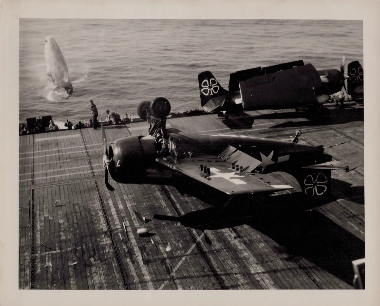 Fighter Aircraft Overturned on Flight Deck of U.S.S. Petrof Bay (CVE-80) During Landing Mishap, April 16, 1945