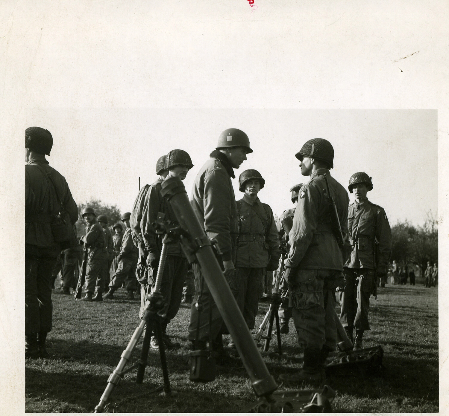 101st Airborne Paratroopers Gather Around a 60mm Mortar During a Field Briefing