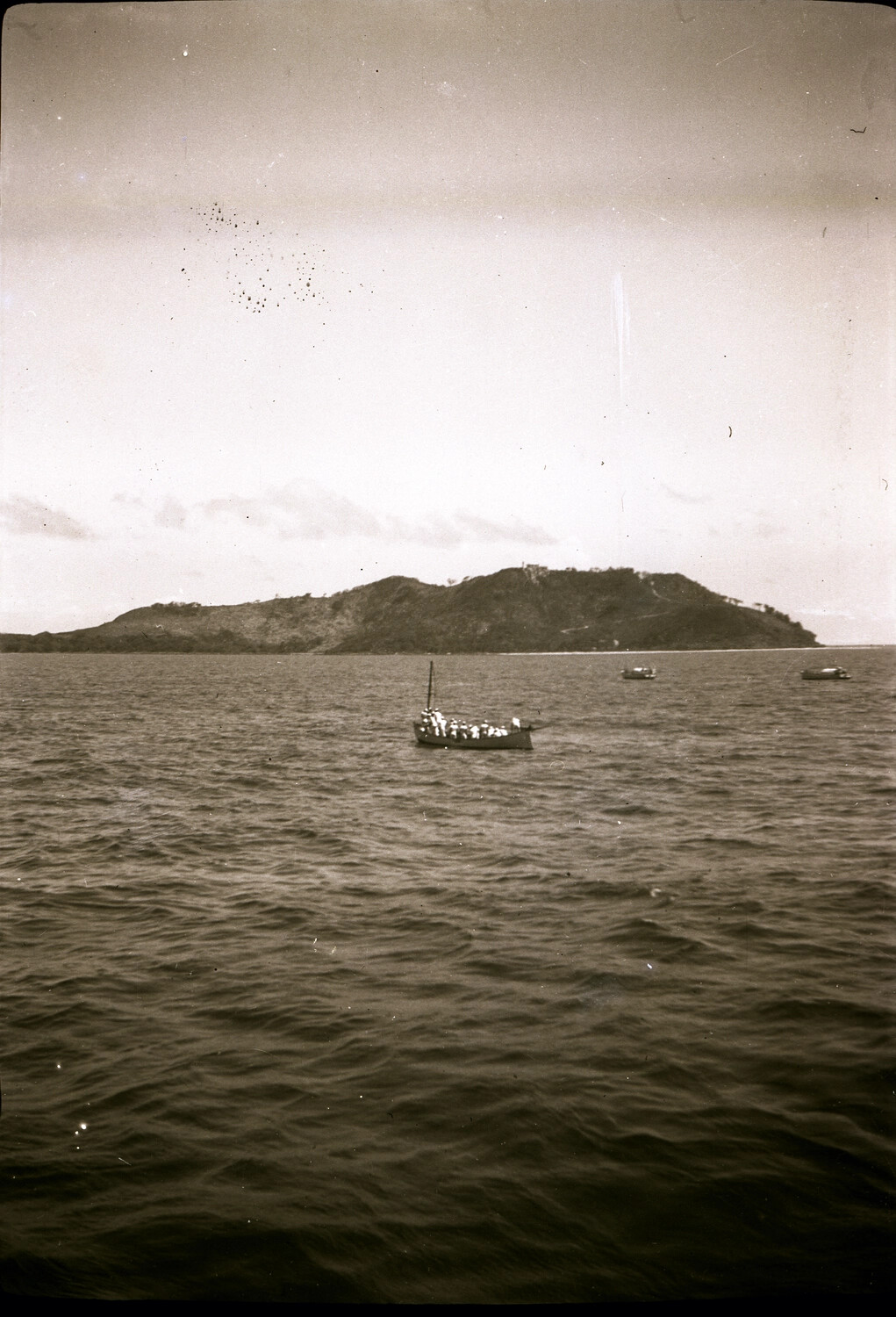 US Navy Ship's Boat Underway off a Coastal Headland, China/Pacific Station, 1930s