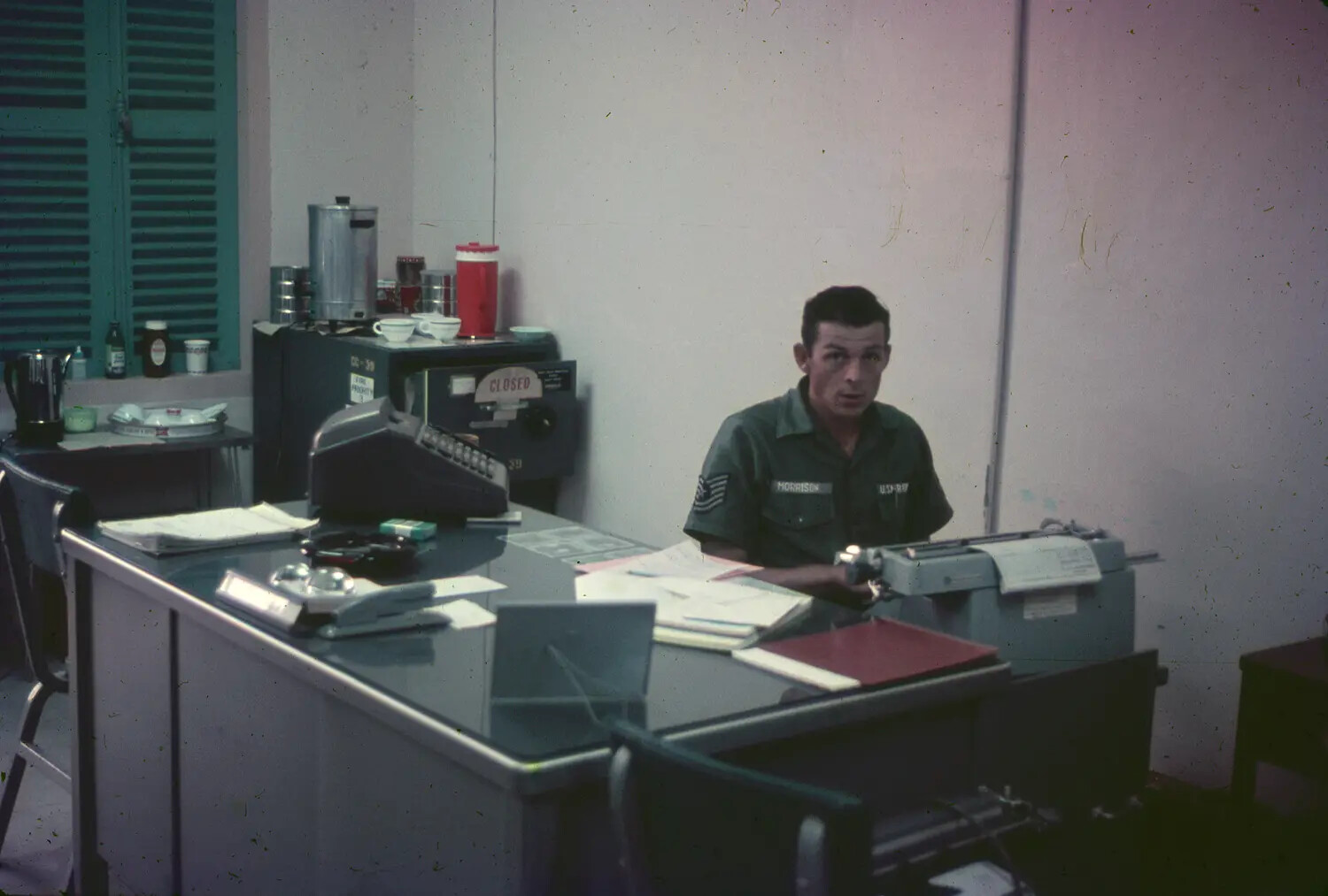 USAF Administrative NCO (Sgt. Morrison) at Desk, 3rd Tactical Fighter Wing Office, South Vietnam, 1965