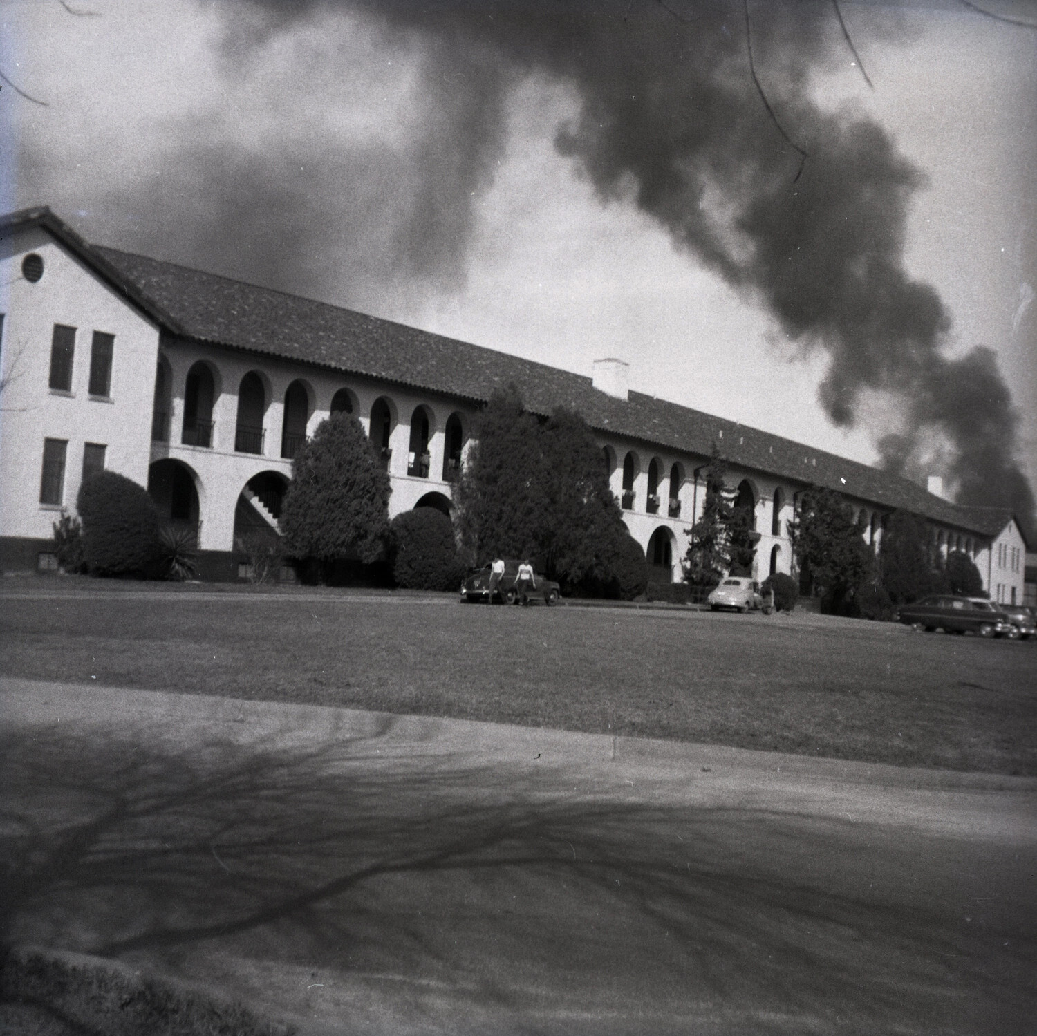 Barracks Building Beneath Plume of Black Smoke, USAF Base, 1950s