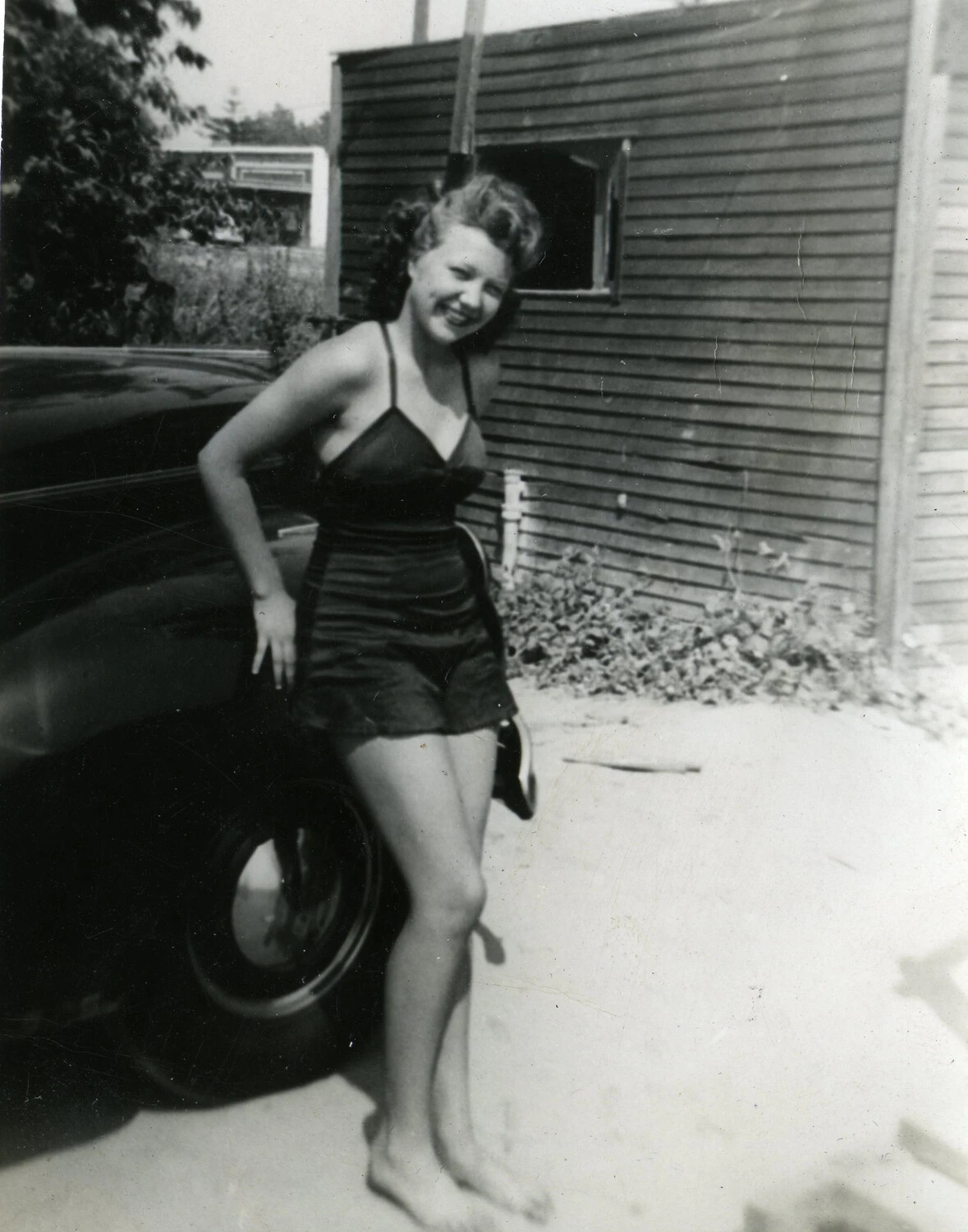 Young Woman Posing Beside Automobile, Home Front Snapshot, VMF-214 Album, WWII Era