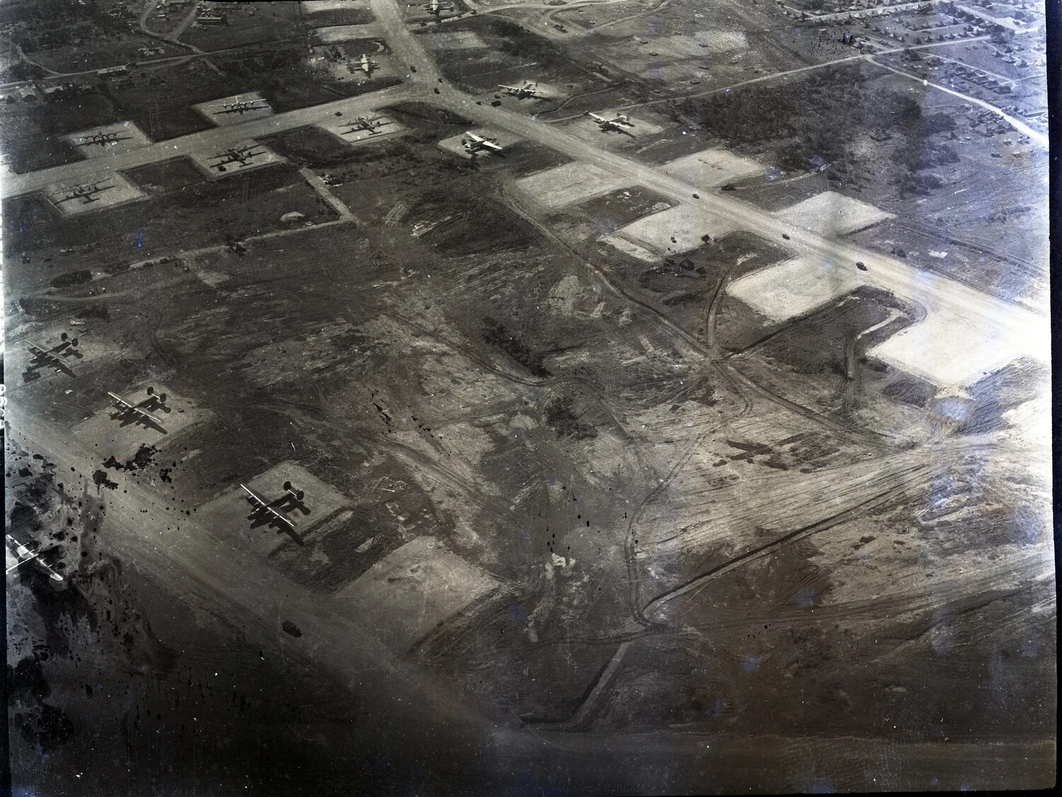 Vertical Aerial Reconnaissance Photograph of Enemy Airfield with Dispersed Aircraft, Pacific Theater, WWII