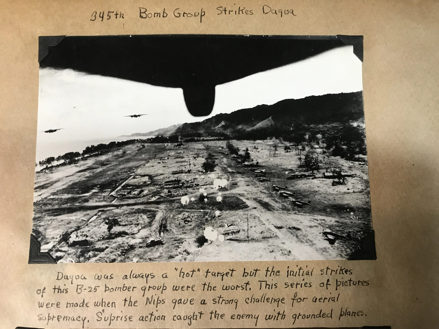 345th Bomb Group Strikes Dagua Airfield - Original Caption, New Guinea
