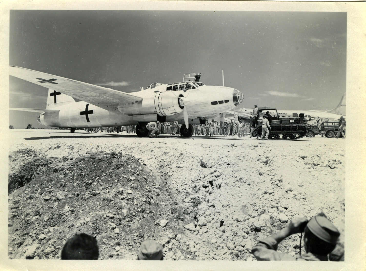 Crowd of American Servicemen Surround Japanese Surrender Delegation Aircraft, Ie Shima, August 1945