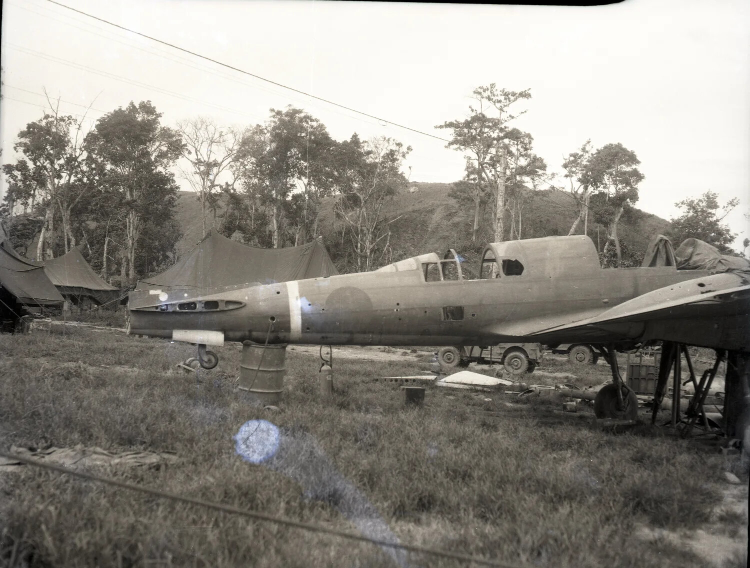 Captured Japanese Military Aircraft Under Inspection at Jungle Airfield, Pacific Theater, WWII (Large Format Negative)