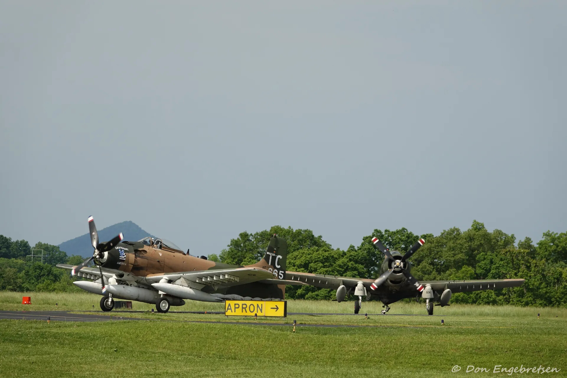 Two Restored A-1 Skyraiders Taxiing at Fly-In Event, May 2019