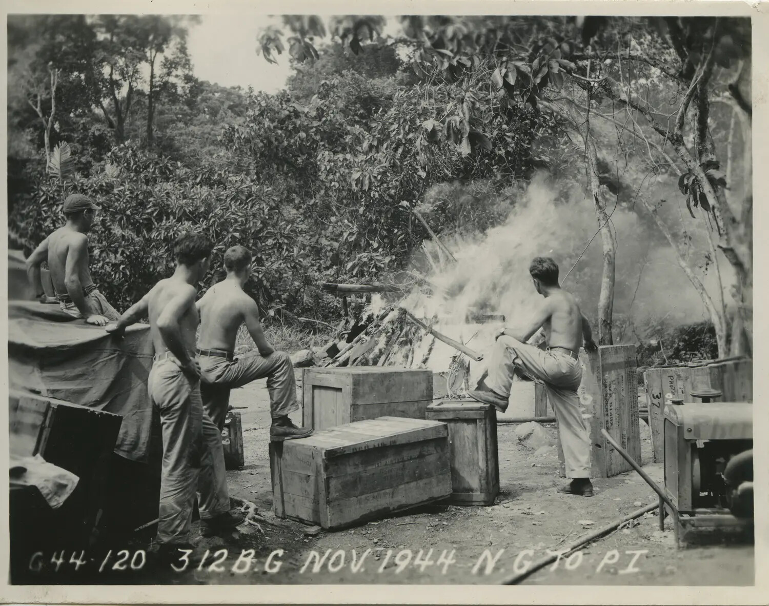312th Bomb Group Airmen Burning Camp Debris Before Relocation, November 1944