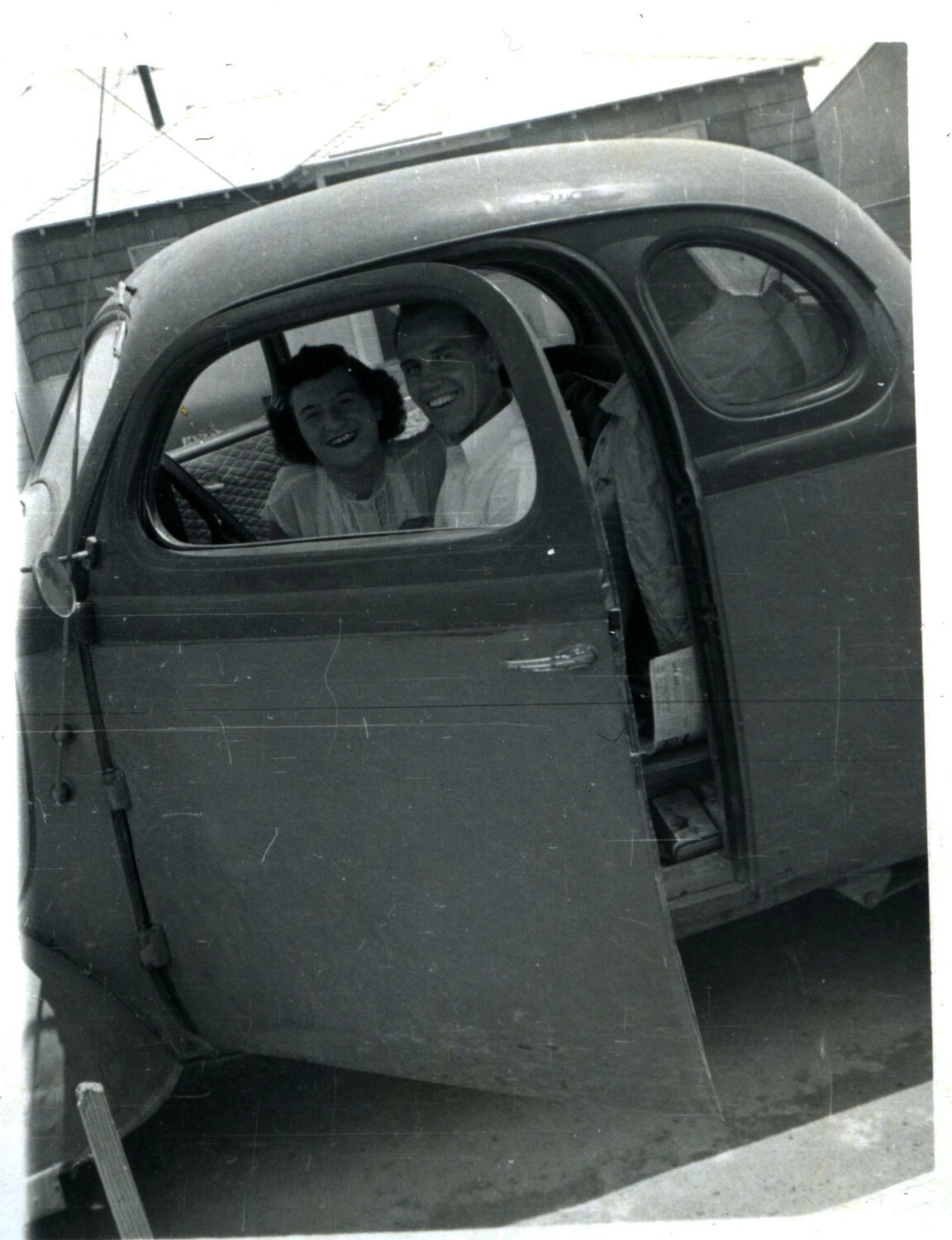 Couple Seated in Vintage Automobile, Bancroft Family/Personal Photograph, Korean War Era
