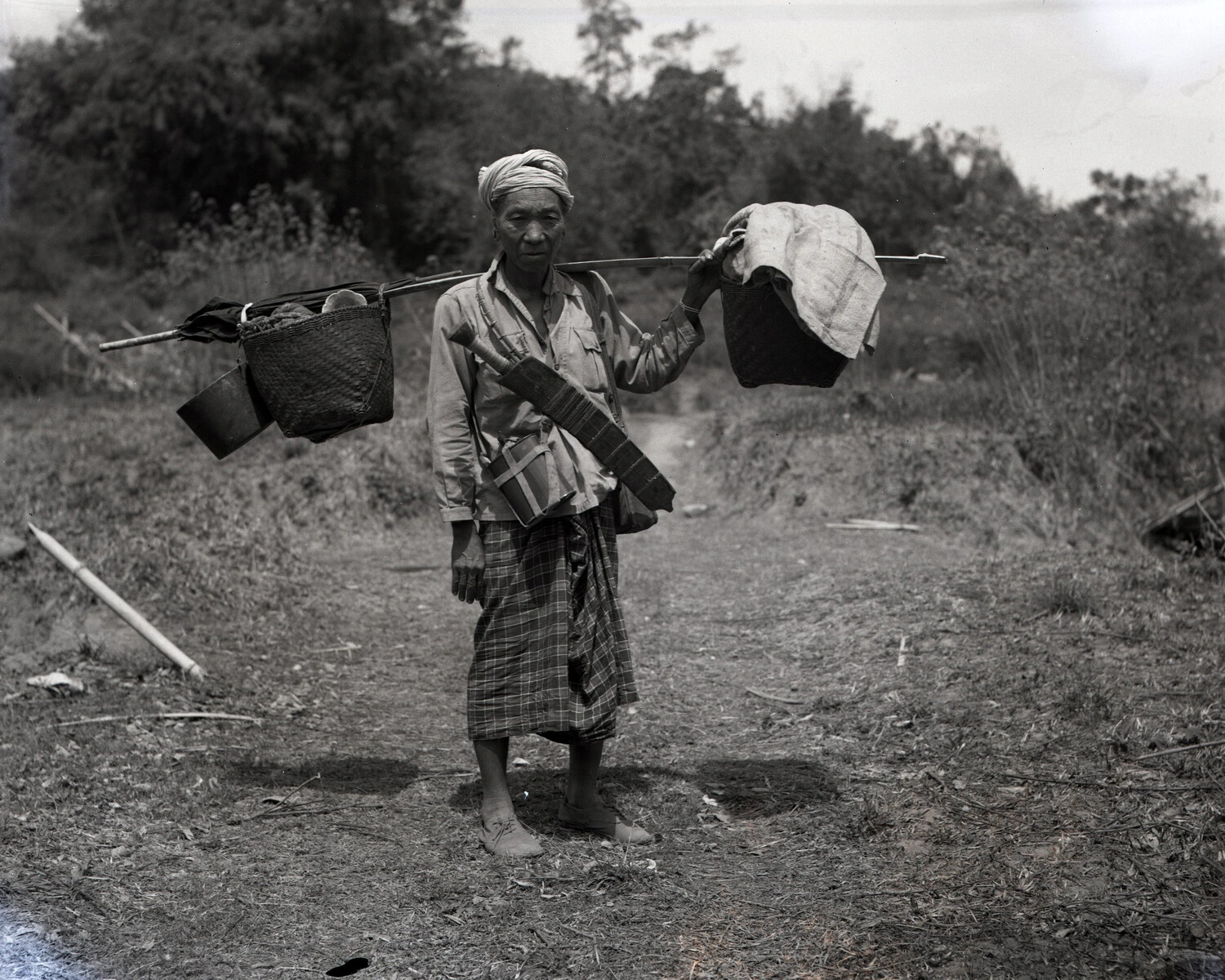 Portrait of a Local Villager with Carrying Pole, Burma, China-Burma-India Theater, WWII