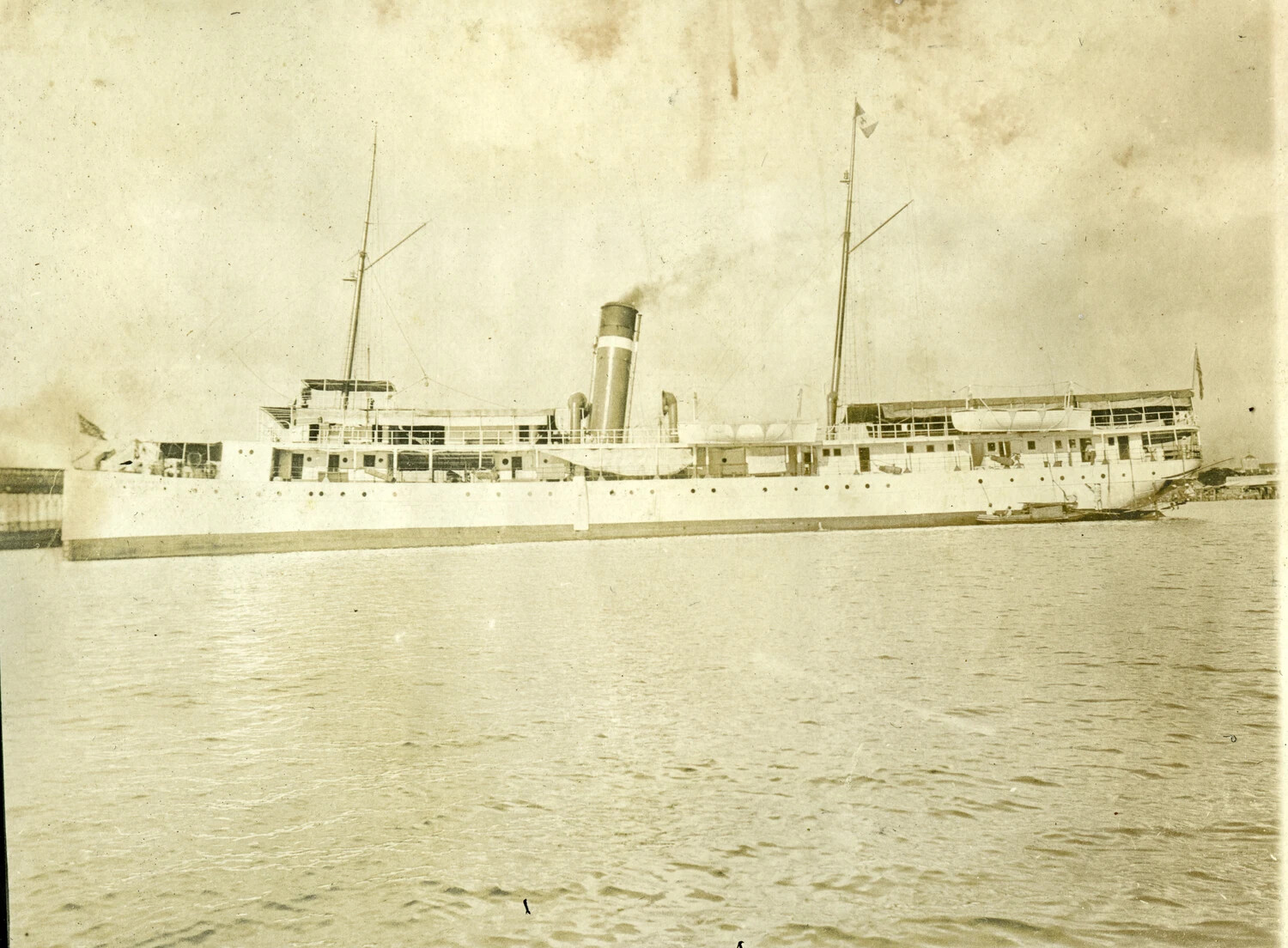 White-Hulled Steamship Moored at Pier, Philippines, Early 1900s — Carl Stone Album