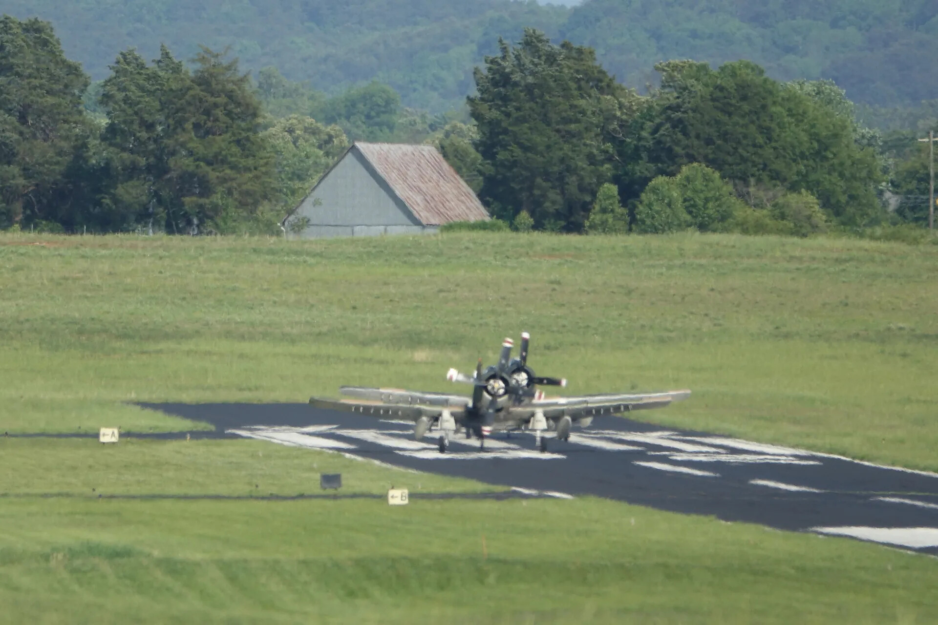 A-1 Skyraider Aircraft Taxiing to Runway at Warbird Air Show