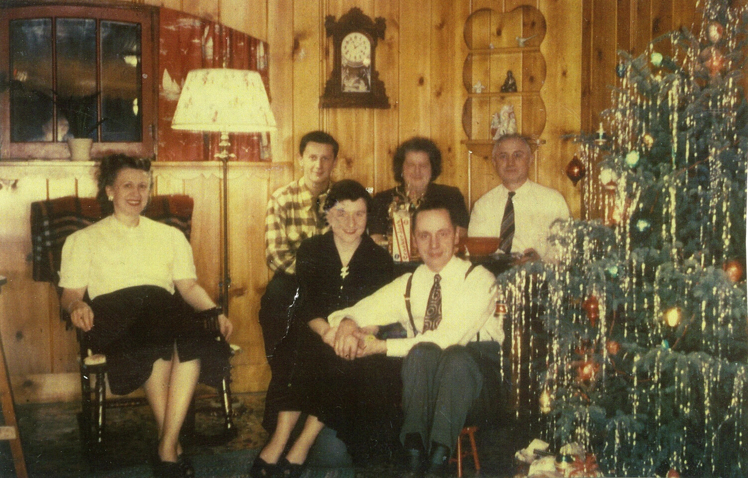 Family Christmas Gathering in Wood-Paneled Living Room, Bancroft Family Collection