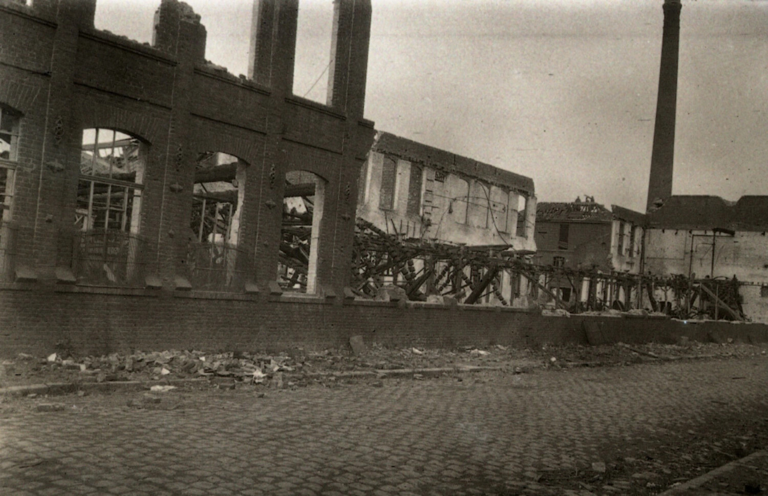Bomb-Damaged Industrial Factory Building with Collapsed Roof Trusses