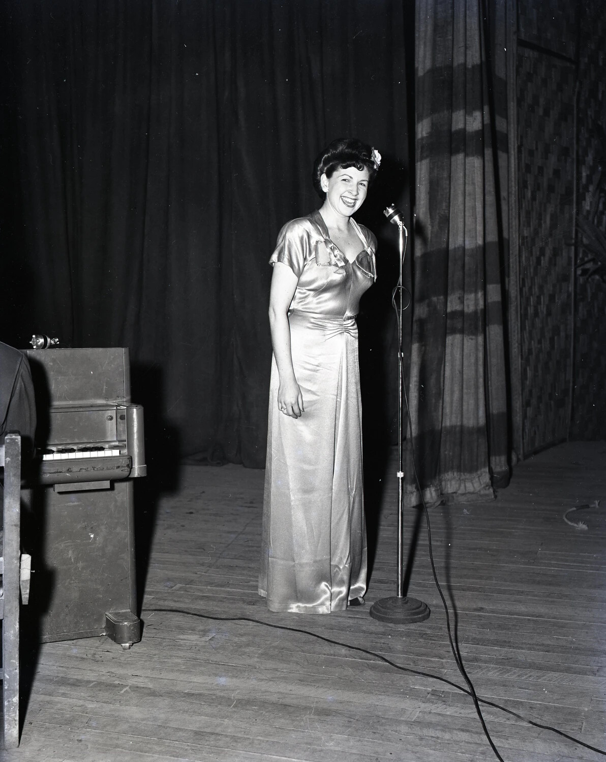 USO-Style Entertainer Performing on a Field Stage, CBI Theater, World War II