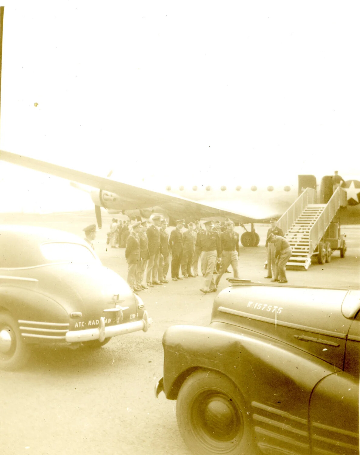 Military Officers Assembled Beside Transport Aircraft During Formal Arrival, Keesler Field, 1946