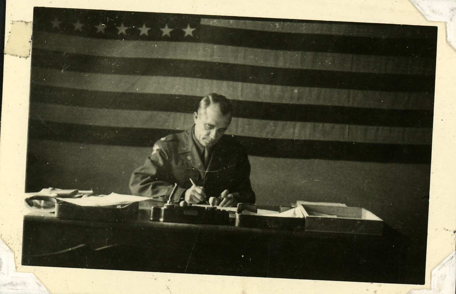 U.S. Army Officer Signing Documents Before American Flag, WWII Australia Military Album