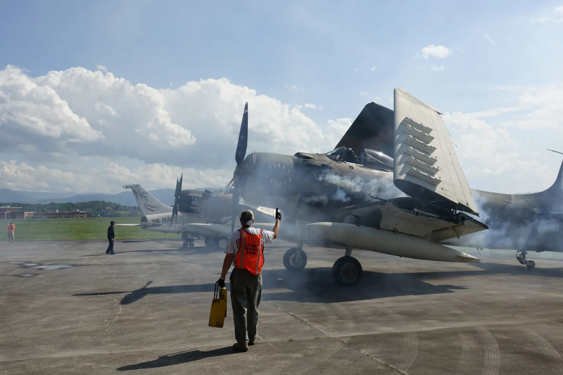 Ground Crew Marshaling A-1 Skyraider "Wiley E Coyote" at Engine Start, Tennessee Museum of Aviation