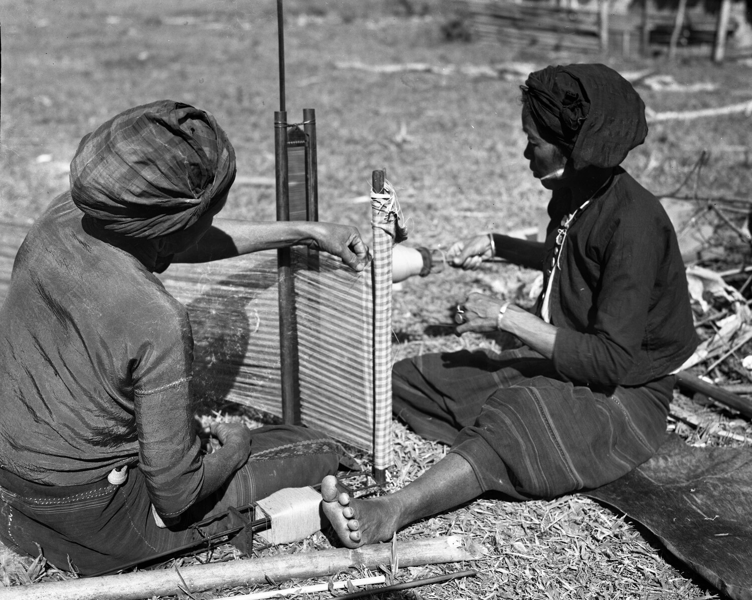 Local Women Weaving on a Backstrap Loom, Burma, World War II Era