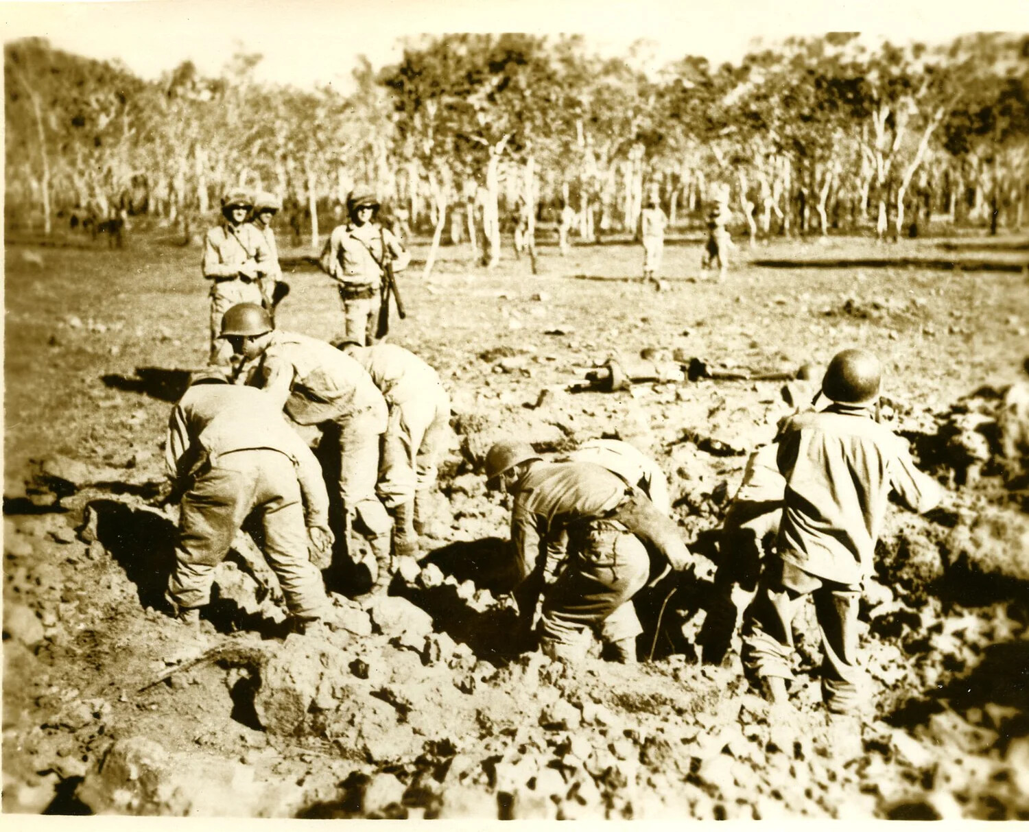 Soldiers Digging Fighting Position/Crater, Field Training Exercise