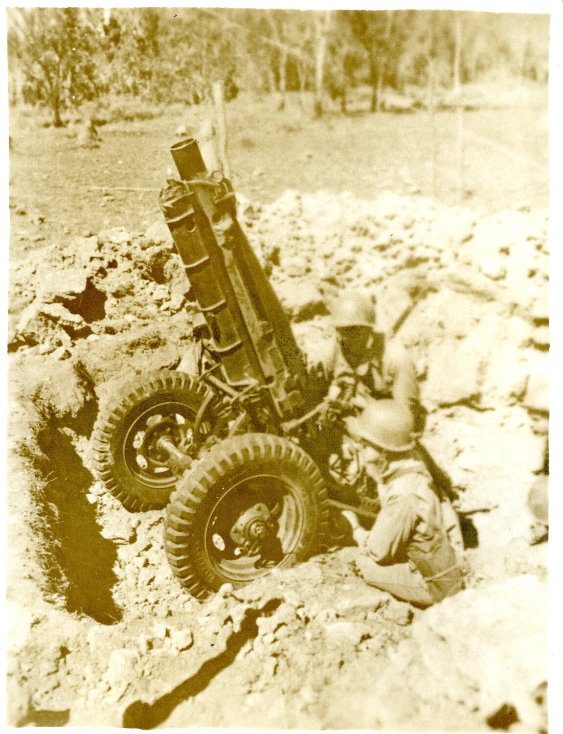 Gun Crew Emplacing Wheeled Artillery Piece in Dug Position, WWII Training Exercise
