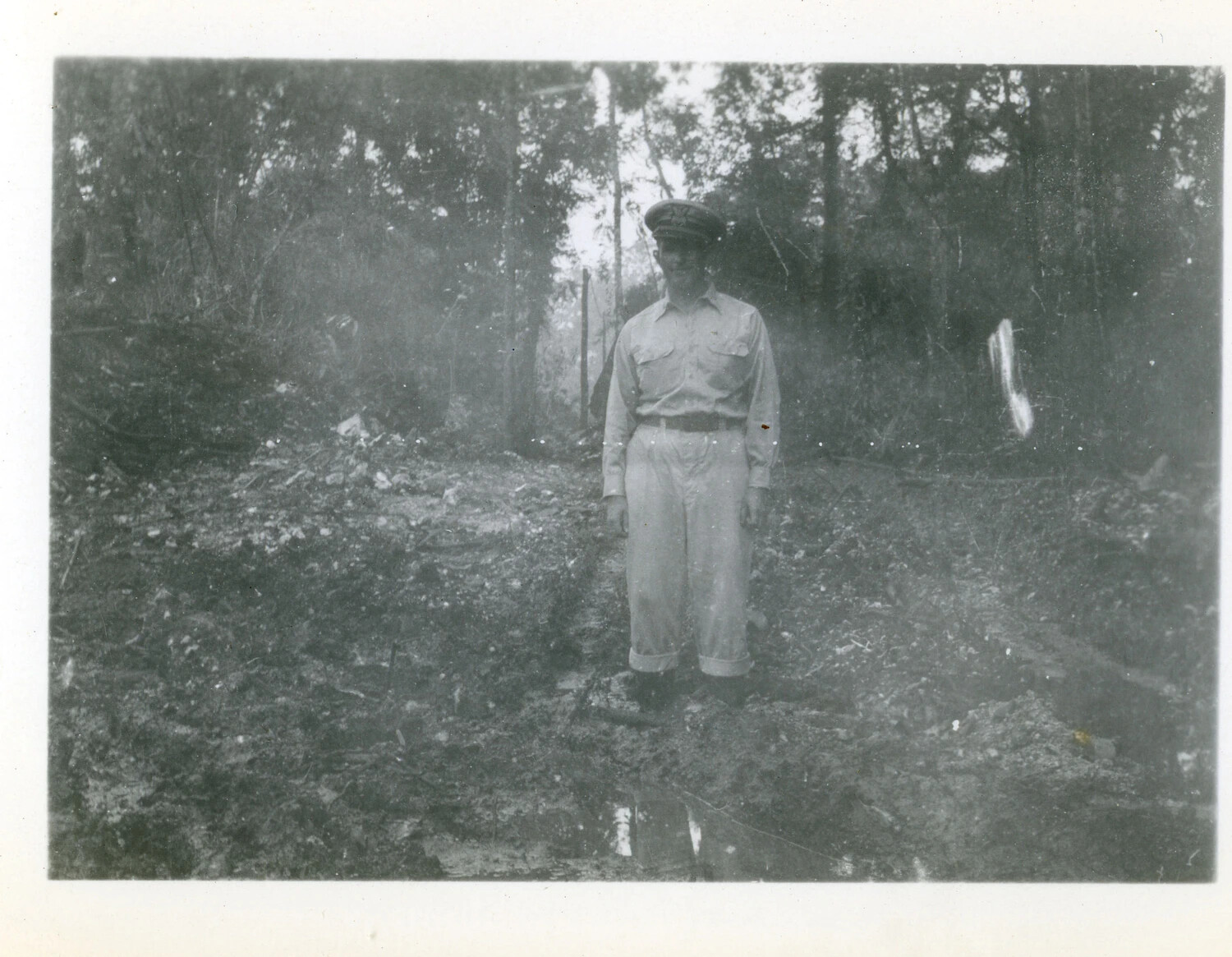 U.S. Navy Officer in a Freshly Cleared Jungle Camp Area, Pacific Island Base, World War II