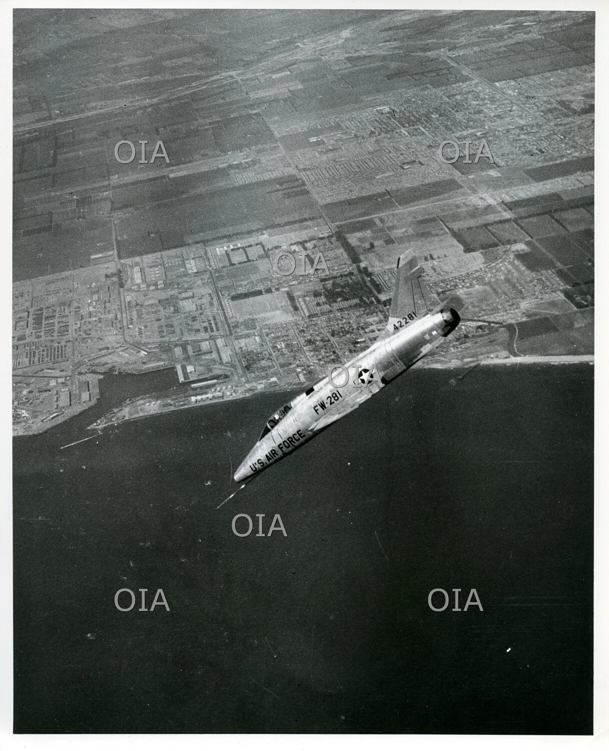 Lockheed F-104 Starfighter (FW-281 / 42281) in Steep Banking Dive Over Coastal City