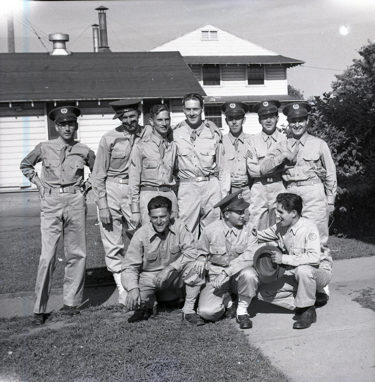 Group Portrait of Ten Servicemen in Summer Service Uniform