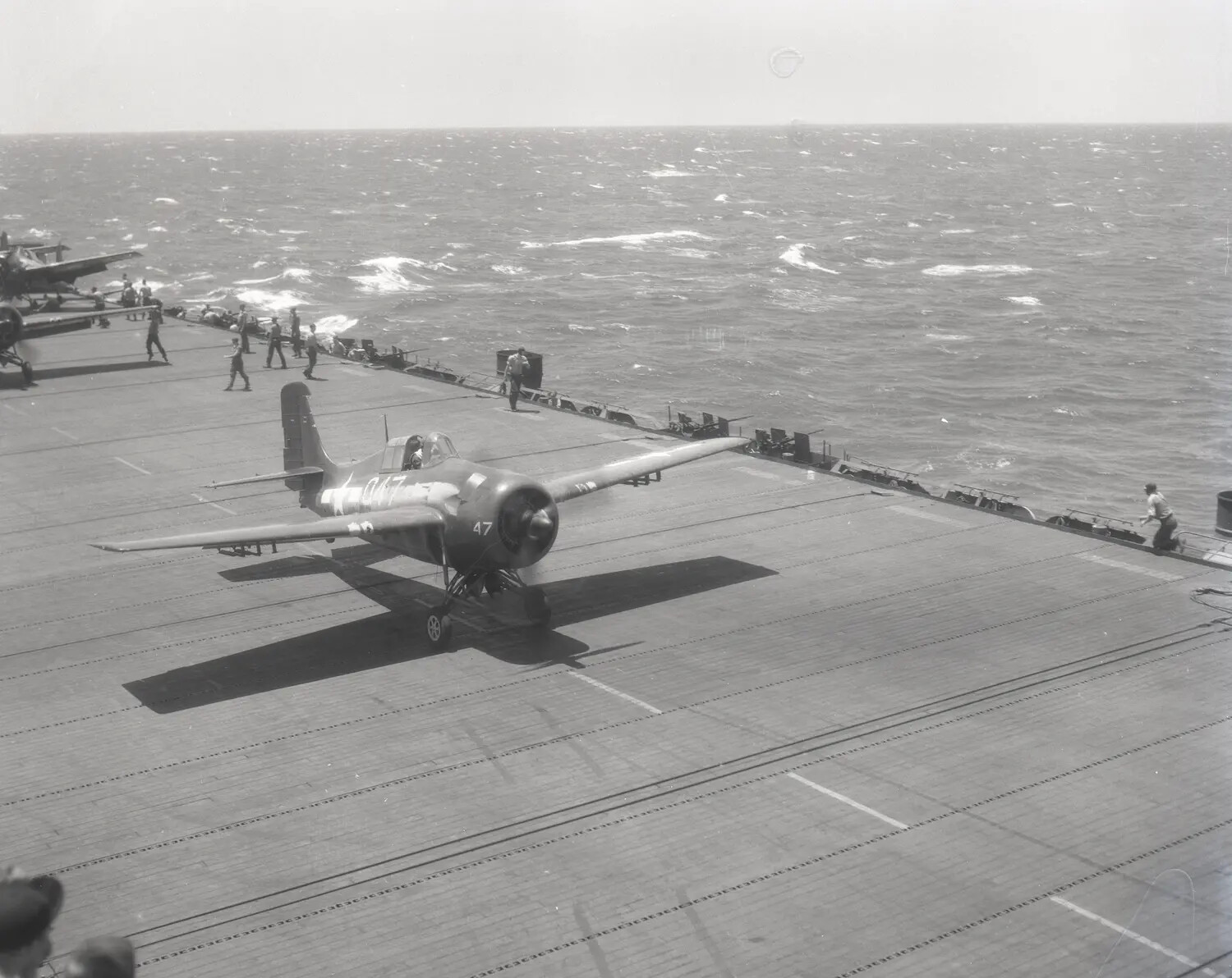 FM-2 Wildcat Fighter '47' on Flight Deck, USS Petrof Bay (CVE-80), World War II